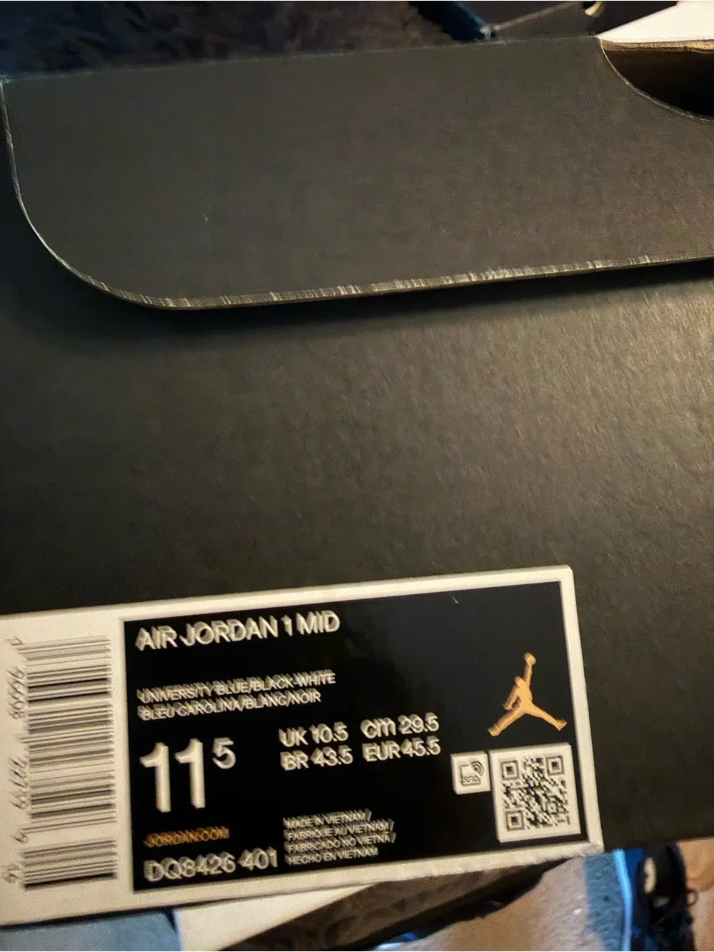 Jordan 1 Mid - Black and University Blue
